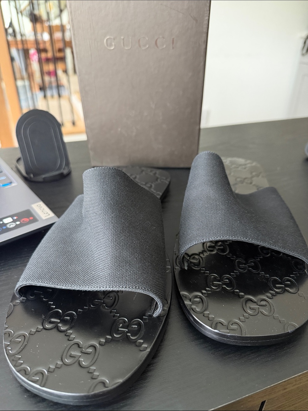 Gucci Men’s Black Embossed Logo Slide Sandals